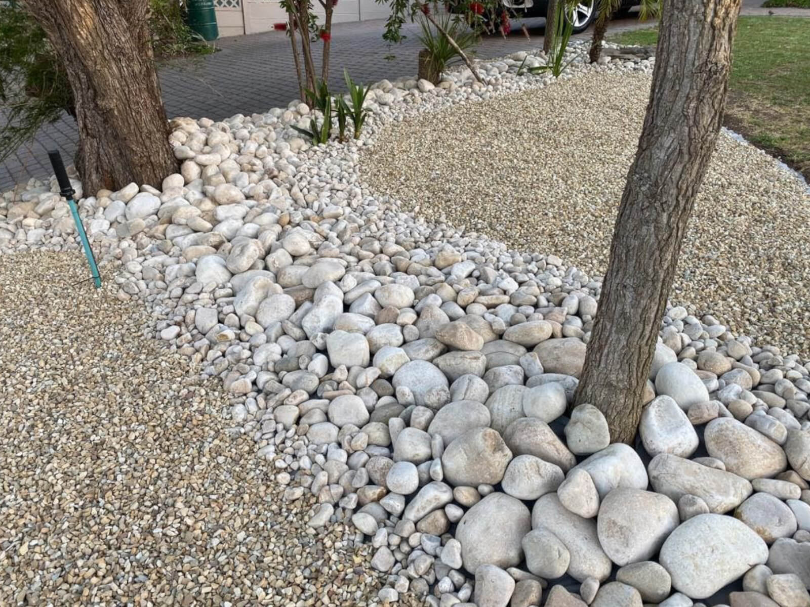 sidewalk with river stone